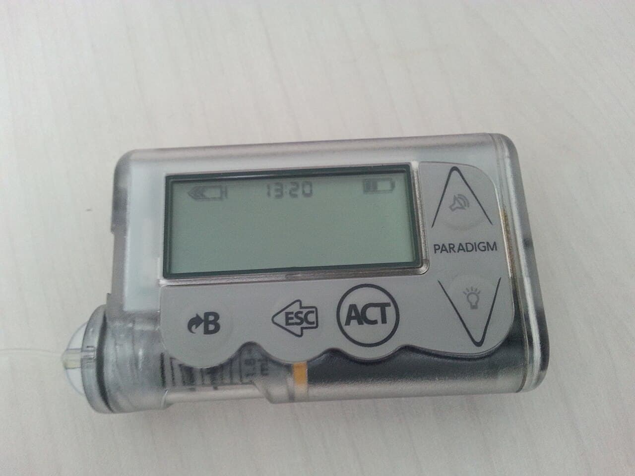 An insulin pump worn against clothing